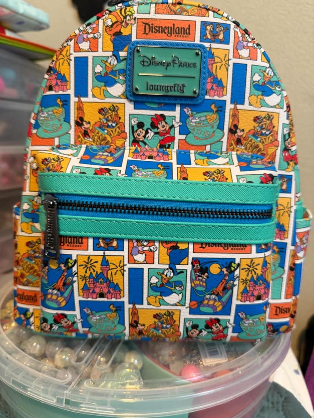 Loungefly  Mini Backpack - Teal, Blue, Yellow Patchwork Disney parks Print
